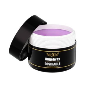 Plastic round container inside which is light purple wax called Desirable Unlimited Edition by Angelwax.