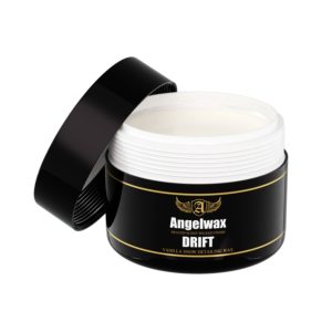 Plastic round container inside which is white vanilla snow detailing wax called Drift by Angelwax.