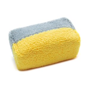 Microfiber rectangular mini applicator block with one side in yellow and one side grey, used for ceramic coatings and wax.