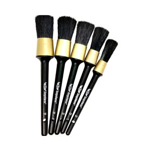 Set of five black and gold detailing brushes with black bristles, all in different sizes.