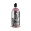 Transparent bottle containing red coloured liquid called Tourmaline Neutral Foam Shampoo