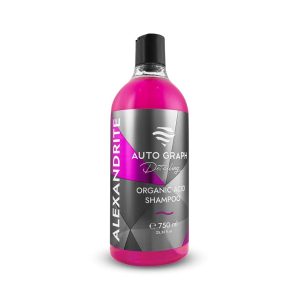 Transparent bottle containing pink coloured liquid called Alexandrite Organic Acid Shampoo