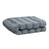 Folded light grey microfiber towel in stripes of long soft high pile and lower twisted loop stripes.