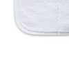 Close up of one corner of white heavyweight microfiber drying towel with edging.