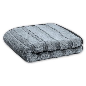 Folded light grey microfiber towel in stripes of long soft high pile and lower twisted loop stripes and with smooth grey edging.