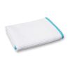 Rectangular folded white waffle-weave towel with a light blue edge.