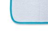 Rectangular close up detail of white waffle-weave towel with light blue soft edge.