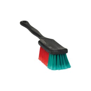 Brush with black handle and green and red bristles.