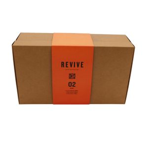 Closed brown rectangular carton box with orange wrap-around paper titled 'Revive 02 - Clean'