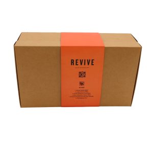 Closed brown rectangular carton box with orange wrap-around paper titled 'Revive IN Interior'