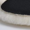 Close up of a heavy cutting knitted wool pad for rotary polishers.