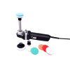 Corded black spot polisher beside some of the accessories and pads that can be used with it.