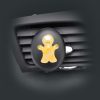 Liquid membrane yellow doll shaped air freshener stuck to vent of car.