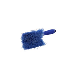 Blue plastic brush with nylon bristles lying on its side