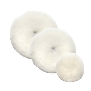 Three white fluffy lambswool pads in varying sizes.