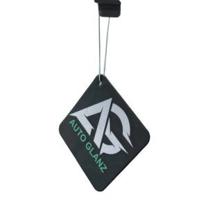 Square flat paper air freshener in black with the Auto Glanz logo hanging diagonally