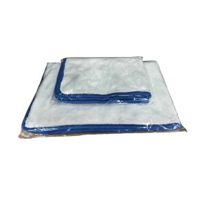 Two microfiber towels with blue edging sit folded on top of each other in separate plastic transparent bags.