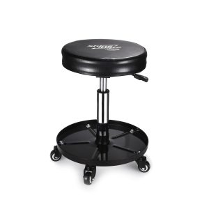 Mobile stool with seat adjustment lever and a metal catch-all tray above castor wheels.