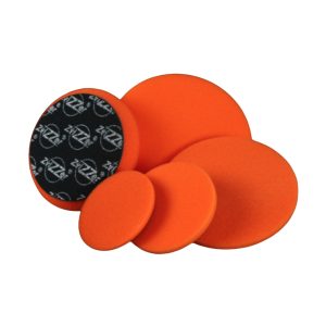 Set of five Zvizzer foam pads in orange colour and varying sizes.