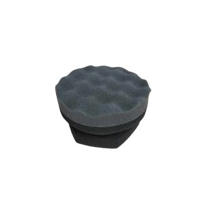 Tyre dressing foam applicator pad with curvy texture for scrubbing and with handle shape.